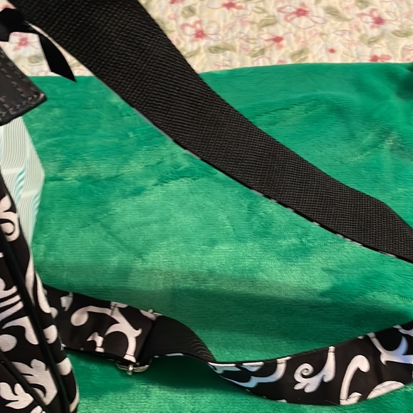 Brand new Thirty- one purse. Black and white swirl design. Several zippers. - Picture 2 of 6